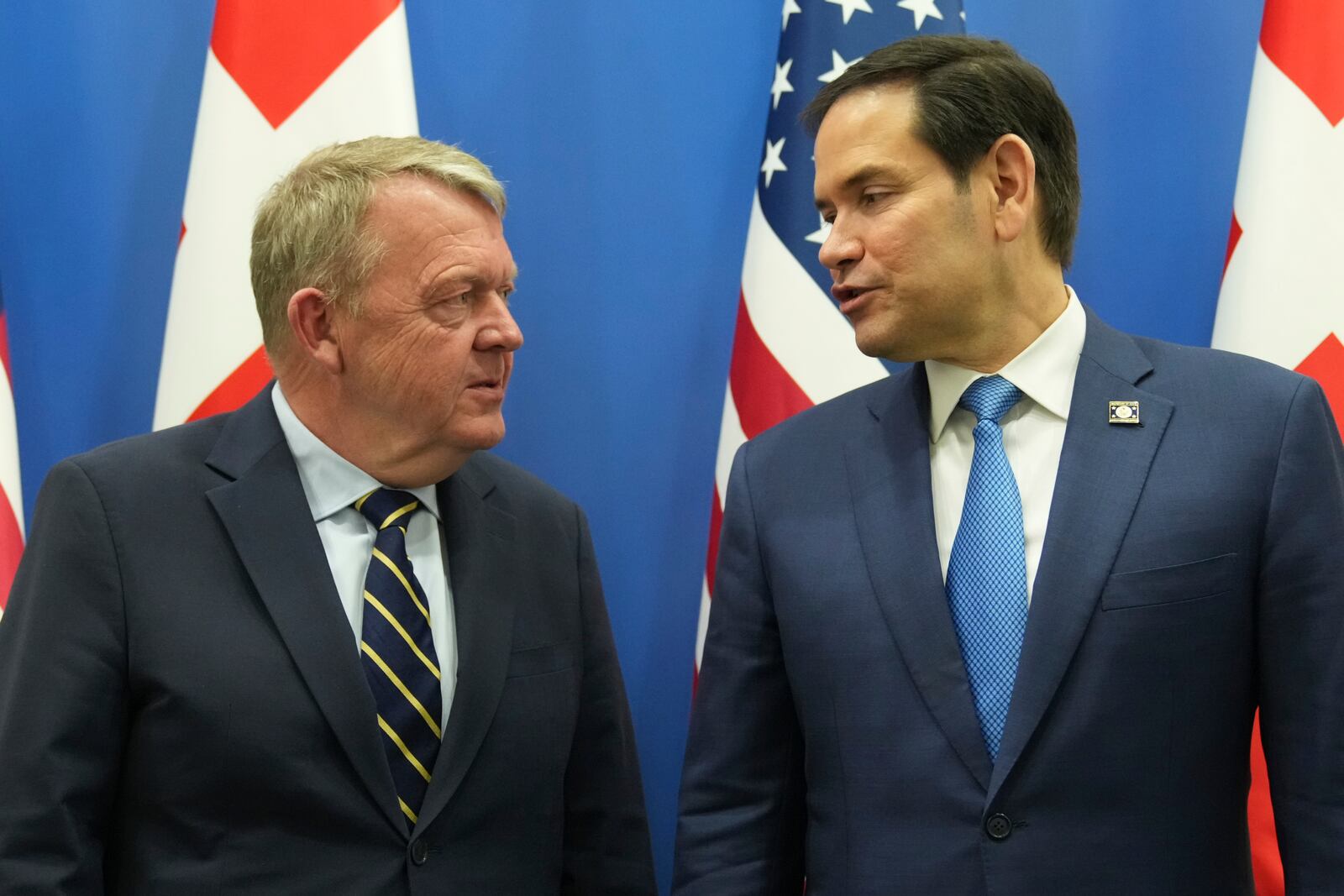 U.S. Secretary of State Marco Rubio, right, speaks with Denmark's Foreign Minister Lars Lokke Rasmussen during a NATO foreign ministers meeting at NATO headquarters Brussels, Thursday, April 3, 2025. (AP Photo/Jacquelyn Martin, Pool)
