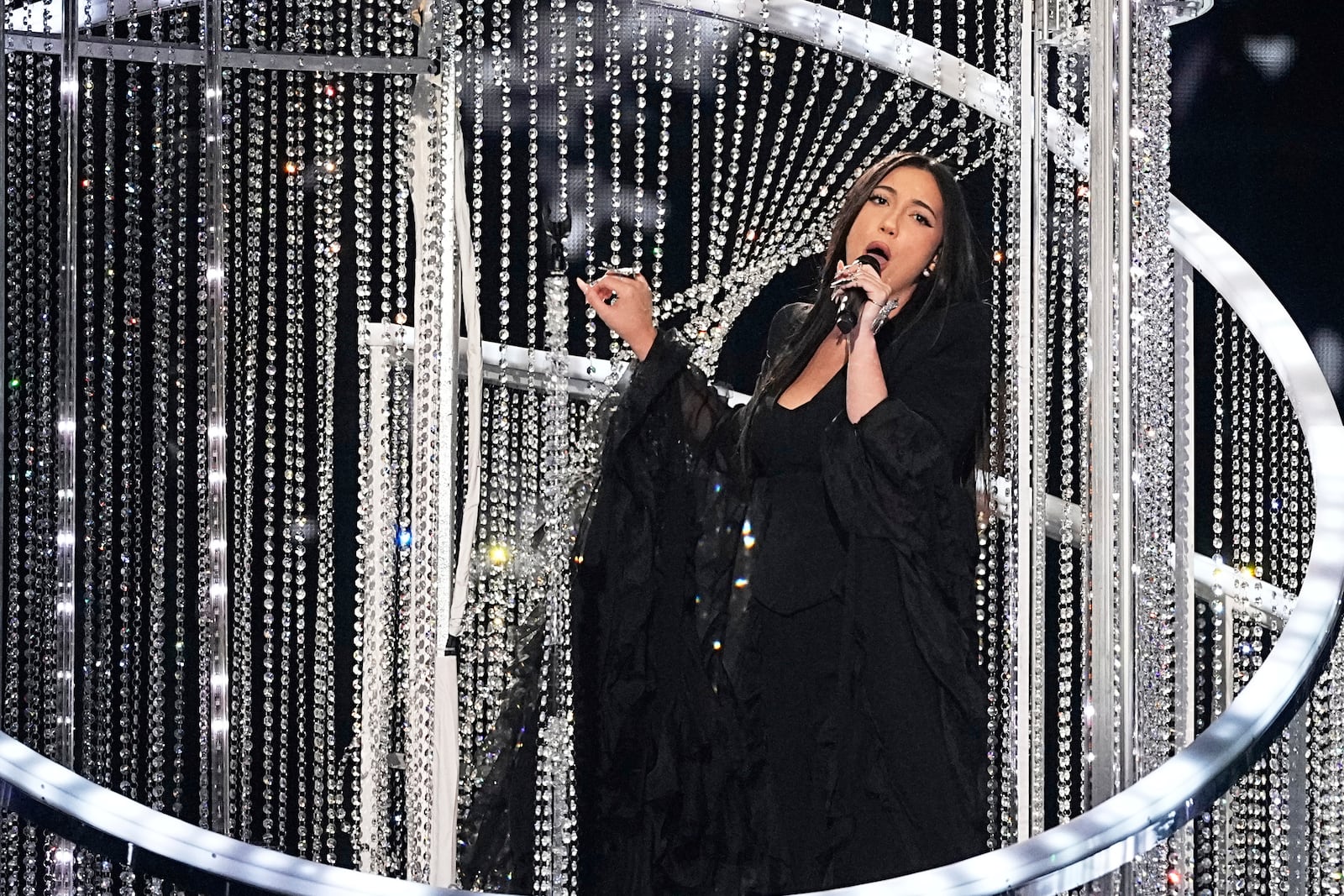 Yuval Raphael from Israel performs the song "New Day Will Rise" during the Grand Final of the 69th Eurovision Song Contest, in Basel, Switzerland, Saturday, May 17, 2025. (AP Photo/Martin Meissner)