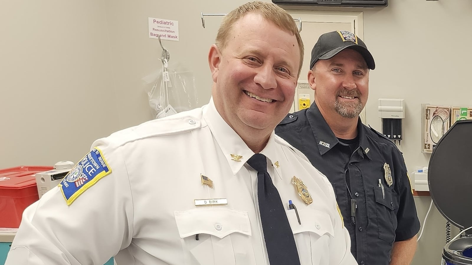Middletown Division of Police chief David Birk, left, is shown in file photo involving barricade buckets distributed to Middletown school classrooms. Birk has been on paid leave since Dec. 20, 2023. NICK GRAHAM/STAFF