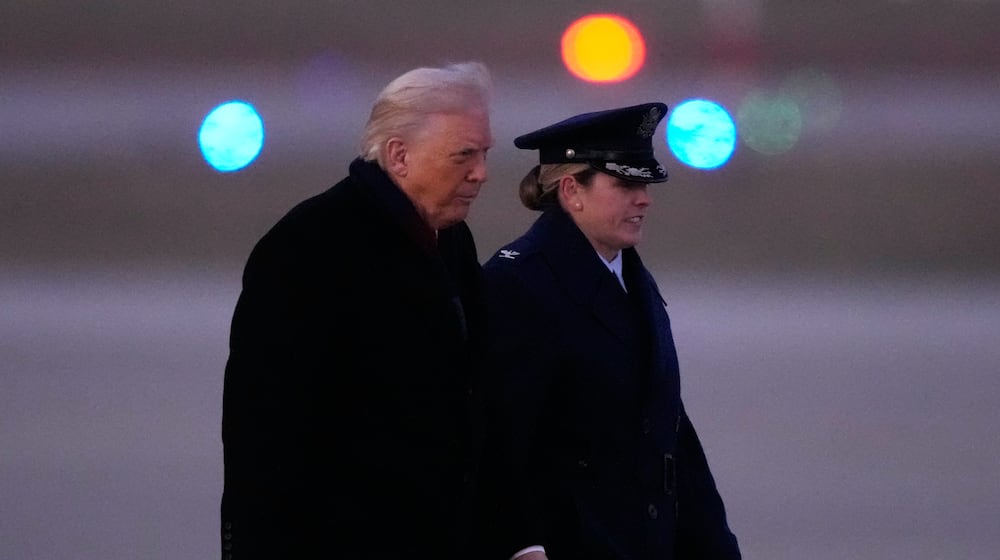 President Donald Trump exits Marine One, Tuesday, Dec. 9, 2025, at Joint Base Andrews, Md., for a trip to Pennsylvania. (AP Photo/Mark Schiefelbein)