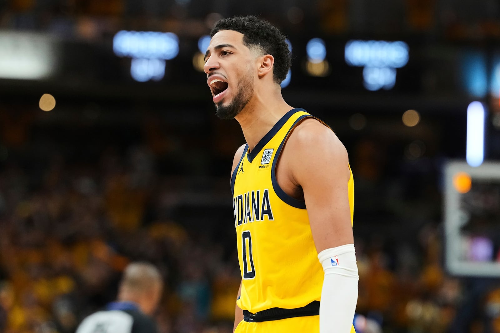 Indiana Pacers guard Tyrese Haliburton (0) reacts to a foul call during the second half of Game 6 of the Eastern Conference finals of the NBA basketball playoffs against the New York Knicks in Indianapolis, Saturday, May 31, 2025. (AP Photo/Michael Conroy)