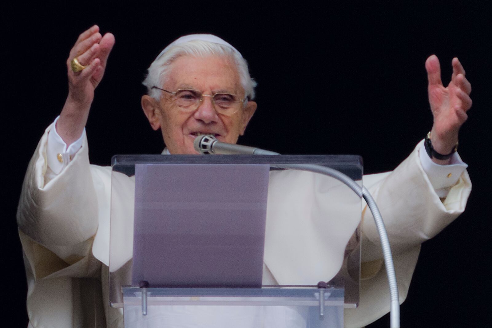 FILE- Pope Benedict XVI delivers his blessing during his last Angelus noon prayer, from the window of his studio overlooking St. Peter's Square, at the Vatican, Sunday, Feb. 24, 2013. (AP Photo/Domenico Stinellis, File)