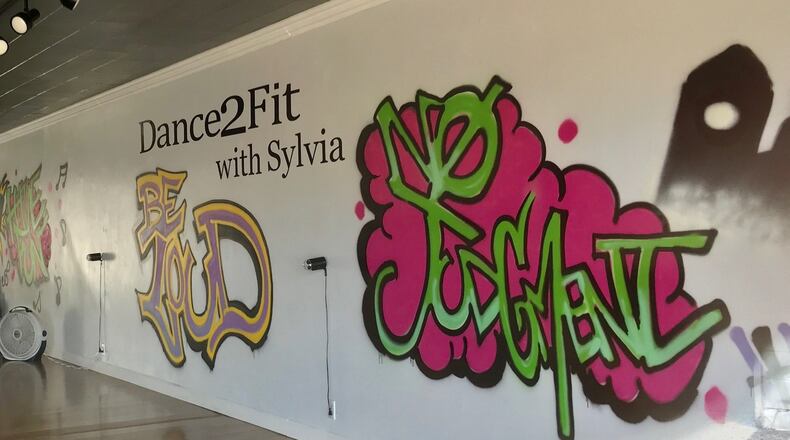 Dance2Fit with Sylvia is the work of Sylvia Hammons. The Hamilton woman started the Main Street business to help people get in shape and stay in shape after her own battle with obesity, which started with dance fitness. NICK GRAHAM/STAFF