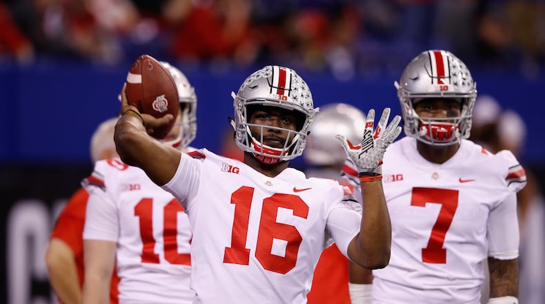 INDIANAPOLIS, IN - DECEMBER 02: Quarterback J.T. Barrett #16 of the Ohio State Buckeyes looks to pass while warming up before taking on the Wisconsin Badgers in the Big Ten Championship game at Lucas Oil Stadium on December 2, 2017 in Indianapolis, Indiana. (Photo by Joe Robbins/Getty Images)