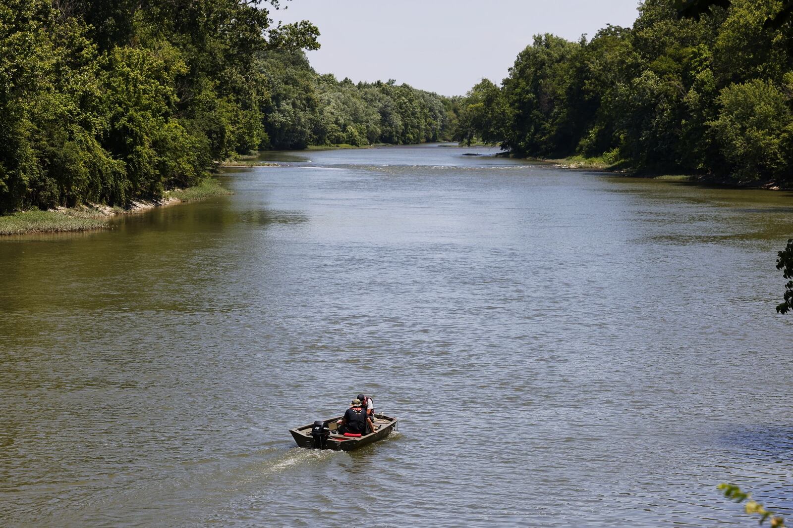 Butler County Sheriff’s deputies searched the Great Miami River on Thursday, June 13, 2024, after a caller reported seeing a person in the water in distress. NICK GRAHAM/STAFF