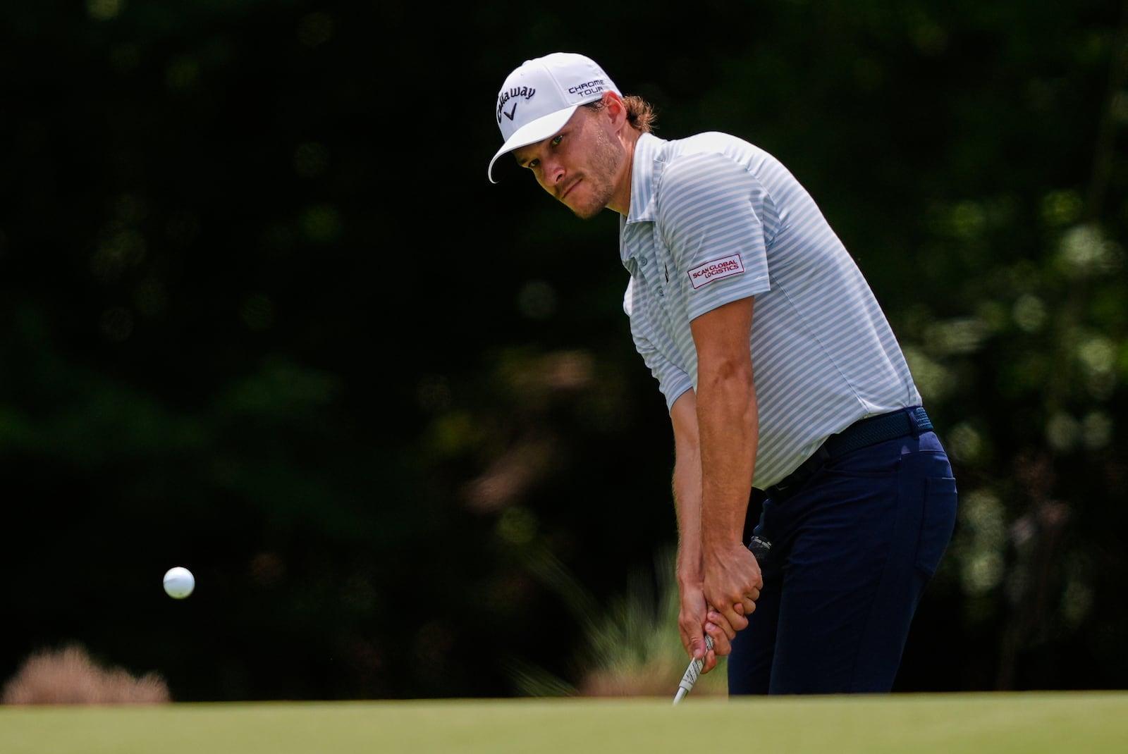 Rasmus Hojgaard, of Denmark, chips onto the 2nd green during the final round of the PGA Zurich Classic golf tournament at TPC Louisiana in Avondale, La., Sunday, April 27, 2025. (AP Photo/Gerald Herbert)