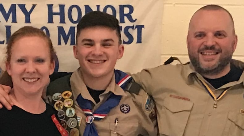 Austin Vanoss, completed his Eagle Scout project in December, building a picnic shelter at the Fairfield Civitan Club. His mother Angela, left and father Brad, right pose with him at his Court of Honor held on Feb. 3.