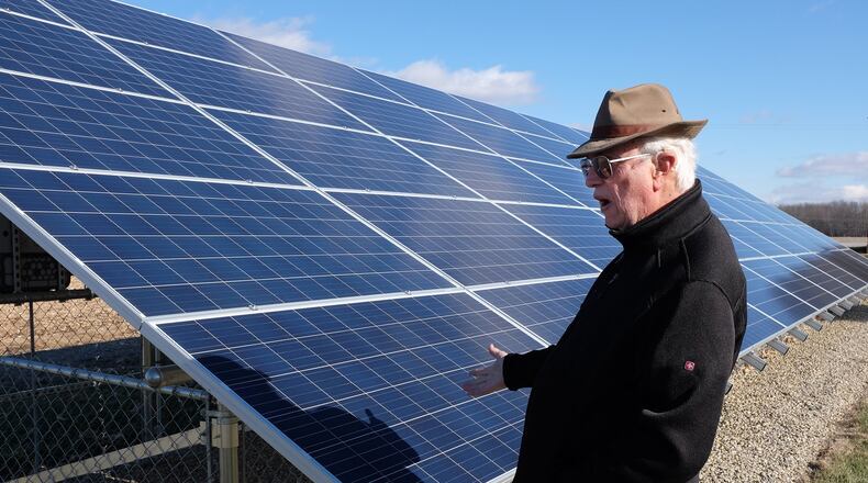 Hamilton officials are developing regulations for how the city’s electric utility would purchase solar electricity from its residential customers. Here, James Groeber, owner of Ohio Solar Electric, LLC, talks about the solar system he installed at a Clark County farm in December 2015. BILL LACKEY/STAFF 2016