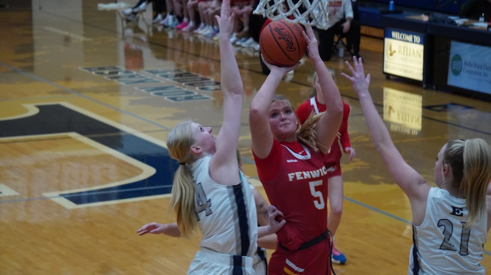 Fenwick’s Lucy Luers goes up for a shot that is contested by Edgewood’s Ella Allen during their game on Thursday at Ron Kash Court. CHRIS VOGT / CONTRIBUTED