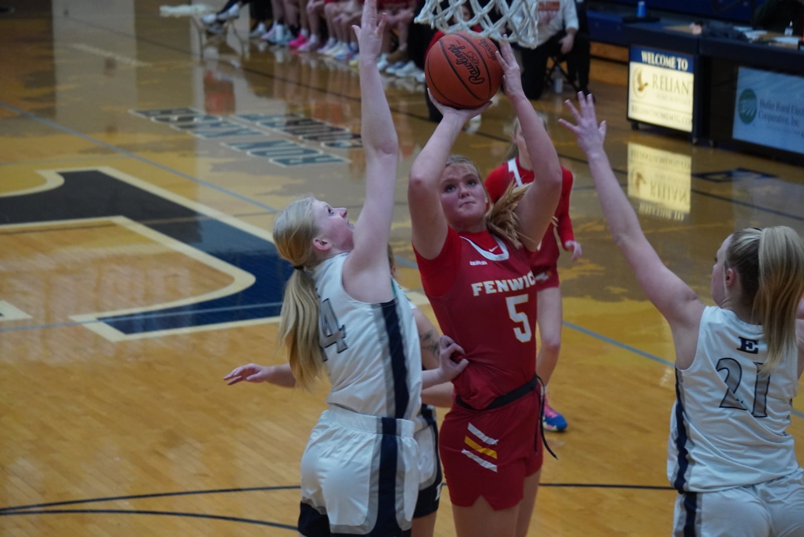 Fenwick’s Lucy Luers goes up for a shot that is contested by Edgewood’s Ella Allen during their game on Thursday at Ron Kash Court. CHRIS VOGT / CONTRIBUTED