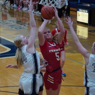 Fenwick’s Lucy Luers goes up for a shot that is contested by Edgewood’s Ella Allen during their game on Thursday at Ron Kash Court. CHRIS VOGT / CONTRIBUTED