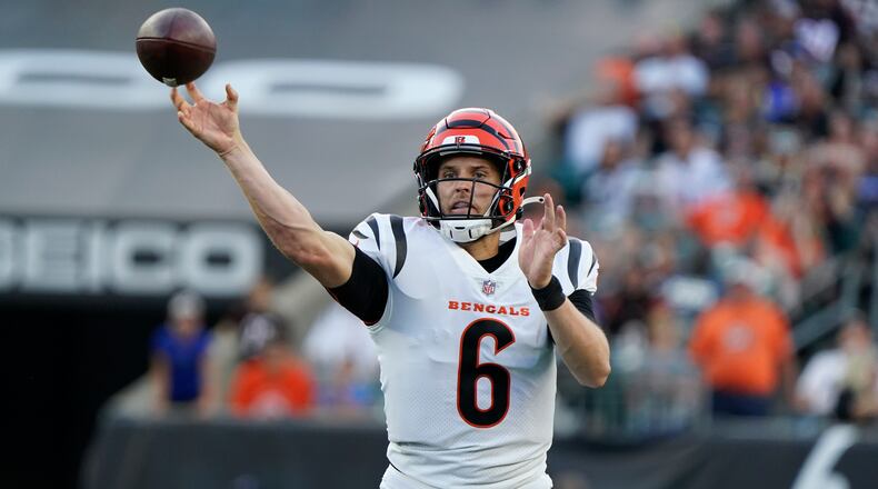 Cincinnati Bengals quarterback Jake Browning (6) throws against the Los Angeles Rams during the second half of a preseason NFL football game in Cincinnati, Saturday, Aug. 27, 2022. (AP Photo/Joshua A. Bickel)