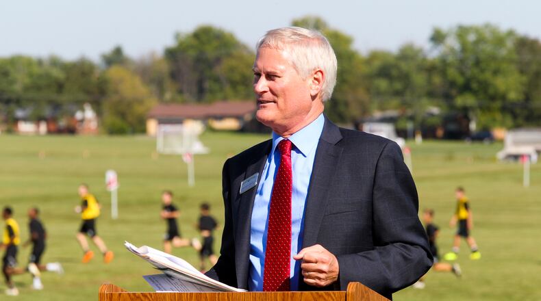 Jonathan Granville, executive director of MetroParks of Butler County, recently received a new 25-month contract. He will receive a salary of $85,696 a year and was granted a $20,000 performance bonus. Granville spoke at the grand opening ceremony and announcement of new facilities at the Voice of America MetroPark in a partnership with West Chester Hospital in late 2014. GREG LYNCH/STAFF