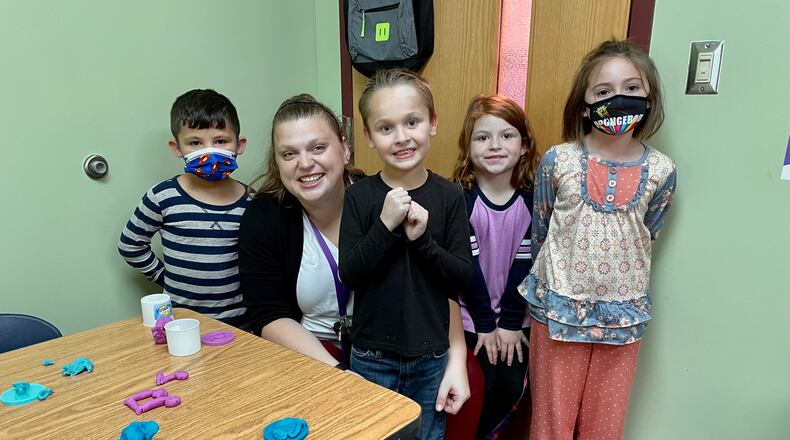 Middletown Schools have received $26 million in federal COVID-19 funds to help offset the costs and challenges of the pandemic since its onset in March 2020. Among the upgrades paid for with the funds are the addition of school counselors in each of the 10 city school buildings. Among the new counselors is Lexie Stelnicki, seen her with students at Amanda Elementary. (Provided Photo\Journal-News)