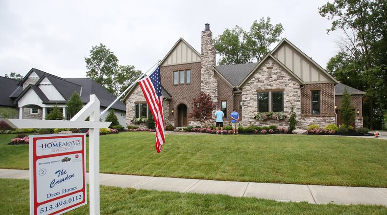 Contractors put the finishing touches on homes that are part of Homearama 2017, which is set for its 54th show, running until July 23 at Rivercrest at 1295 U.S. 22 in Warren County’s Hamilton Twp. GREG LYNCH / STAFF