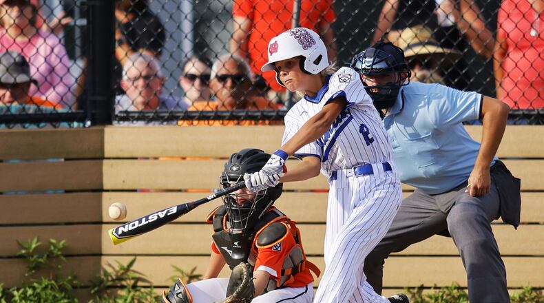 Hamilton’s Cash Brown makes contact with the ball during Hamilton West Side Little League's 10-1 win over Loveland in District 9 Little League championship Monday, July 11, 2022 at Home of the Brave Park in Loveland. NICK GRAHAM/STAFF