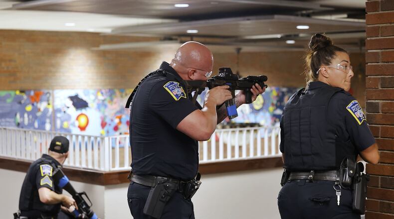 Middletown City Schools and Middletown Division of Police recently went through active shooter training scenarios in drills repeated by many districts locally and nationwide as classes begin to open on the 2022-2023 school year. Prompted in part by the May deadly shooting massacre at a Texas elementary school, school officials in Butler and Warren counties are ramping up school building security measures, often with the help of new Ohio school safety grants. NICK GRAHAM/STAFF
