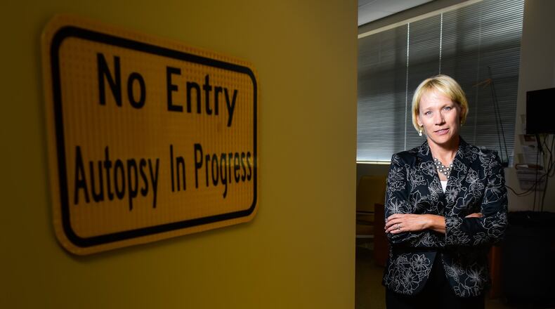 Butler County Coroner Dr. Lisa Mannix said toxicology bills and other expenses tied to handling more drug overdose deaths from the opioid epidemic are taking a toll on the coroner’s office. NICK GRAHAM/STAFF