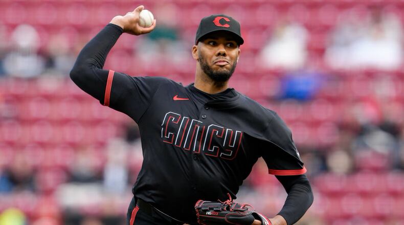Reds All-Star hurler Hunter Greene will take the mound today as starter for the team’s season-opener but this morning hundreds of his specially designed “character cards” were handed out to grade-school students at Fairfield’s Central Elementary. (AP Photo)