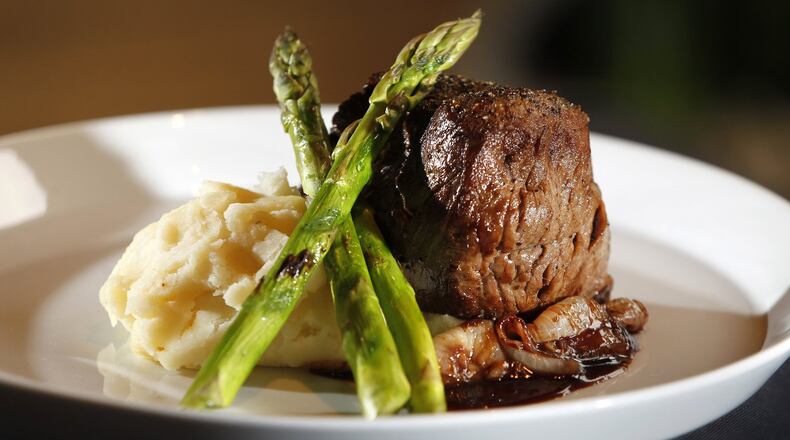 Filet mignon with cipollini onions, bordelaise, grilled asparagus and mashed potatoes from the regular menu at Roost Modern Italian in the Oregon District. The restaurant was founded by chef Dana Downs who takes traditional Italian foods and uses modern techniques and ingredients to develop unique flavors. The dinner-only restaurant is located at 524 E. Fifth St. in Dayton and will be a participant in Winter Restaurant Week. LISA POWELL / STAFF