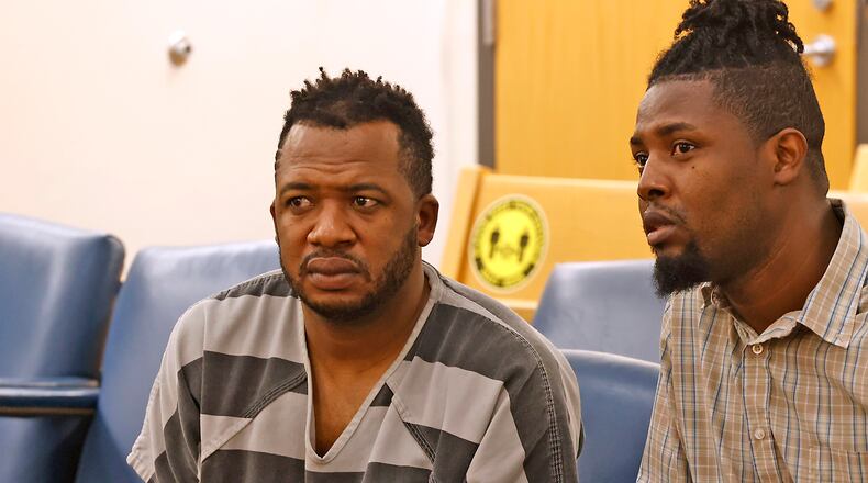 Hermanio Joseph, left, sits with interpreter, Sony Auguste, as he's arraigned in Clark County Municipal Court Thursday, August 24, 2023. Joseph is charged with vehicular homicide for allegedly causing the fatal Northwestern school bus crash on Tuesday. BILL LACKEY/STAFF