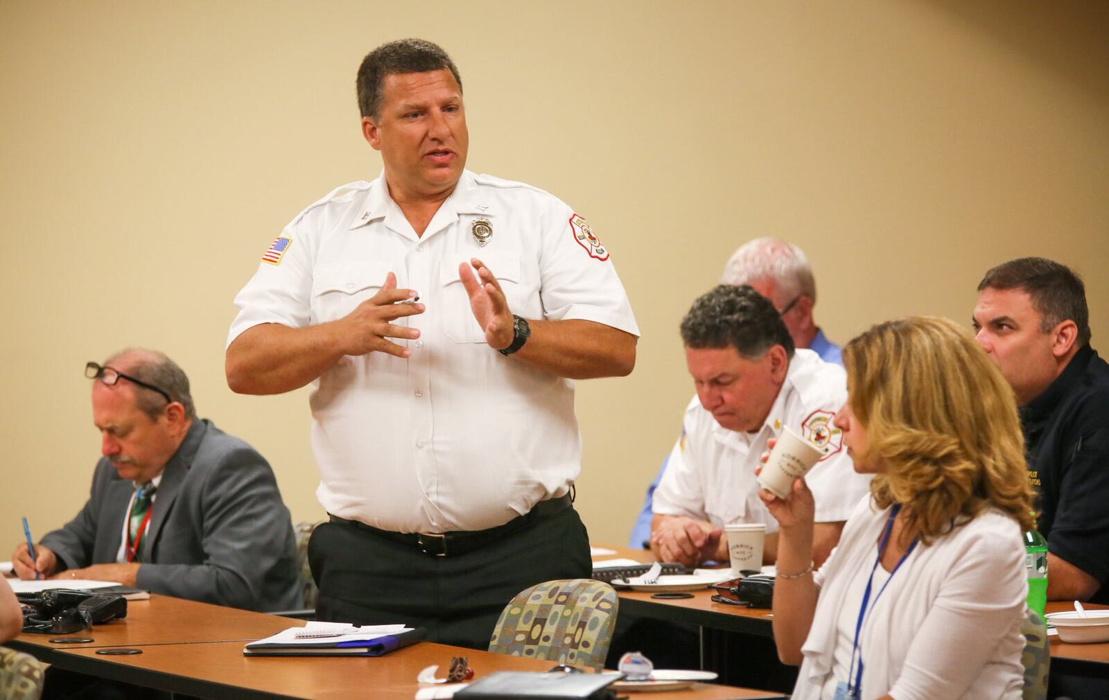 Public Safety Quick Response Team member, Fire Captain David Von Bargen, speaks during the City of Middletown heroin summit at Atrium Medical Center, Monday, June 19. At a time when the illegal drugs are getting more powerful, overdoses continue to rise and leaders are still struggling to find a way to reduce the impact on public safety services. GREG LYNCH / STAFF
