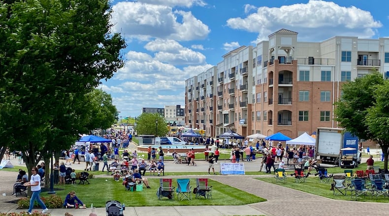 The crowds at a recent food truck rally at this township’s unofficial downtown also gave area residents a taste of the future. The annual Union Centre Food Truck Rally at West Chester Twp.’s central gathering place, The Square @ Union Centre, was the first held with a nearly completed, $50 million, five-story luxury apartment complex now overlooking the square. Between bites of food, some residents shared their thoughts on the massive complex’s impact on the square. MICHAEL D. CLARK/CONTRIBUTED