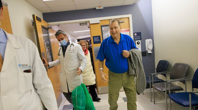 FILE - This image provided by Massachusetts General Hospital shows Tim Andrews smiling as he leaves Massachusetts General Hospital in Boston on Feb. 1, 2025. (Kate Flock/Massachusetts General Hospital via AP, file)
