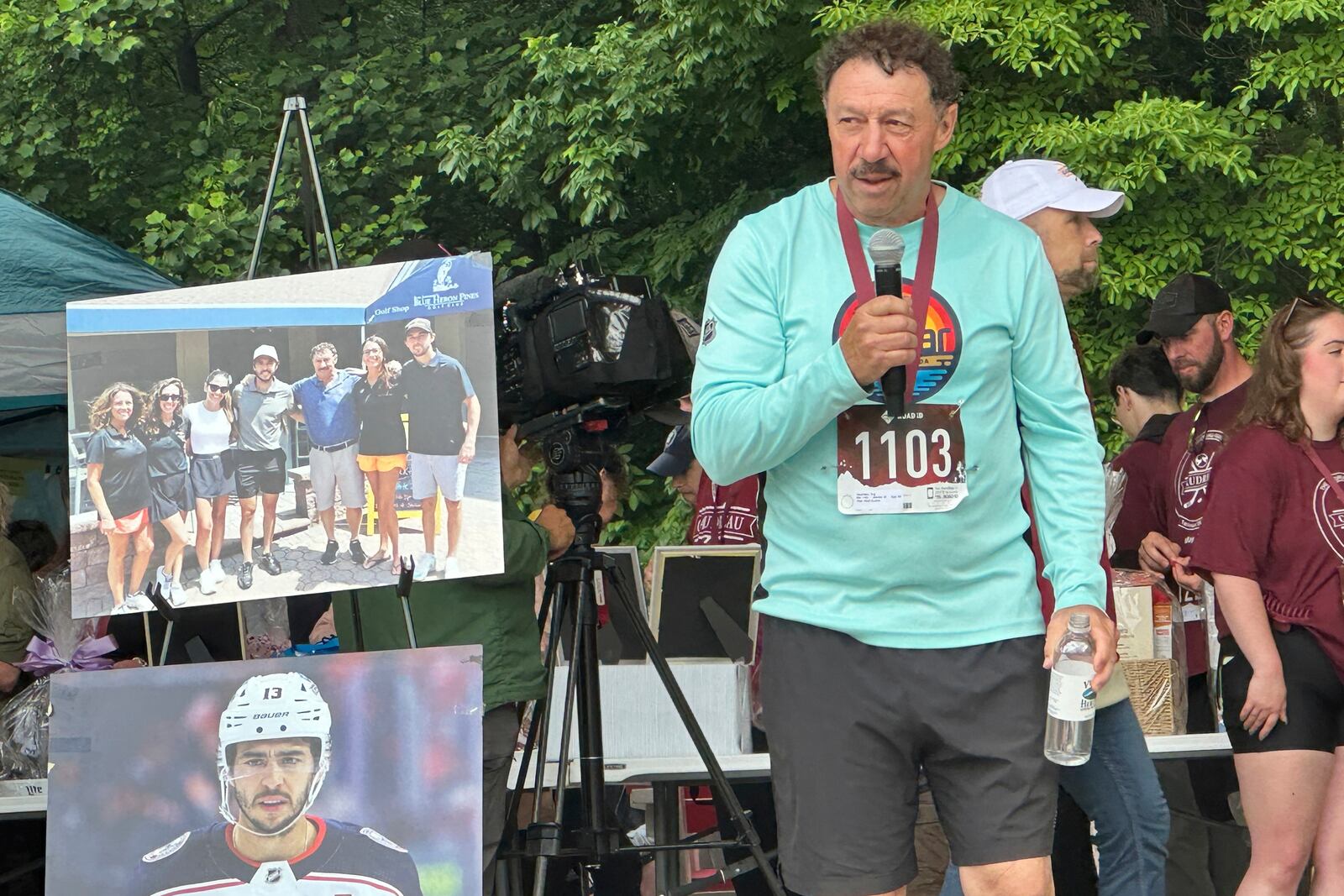 Guy Gaudreau, father of hockey players Johnny and Matthew Gaudreau who were fatally struck by a motorist while riding bicycles, addresses the crowd at the inaugural Gaudreau Family 5K Walk, Run and Family Day, Saturday, May 31, 2025, in Sewell, N.J. (AP Photo/Stephen Whyno)