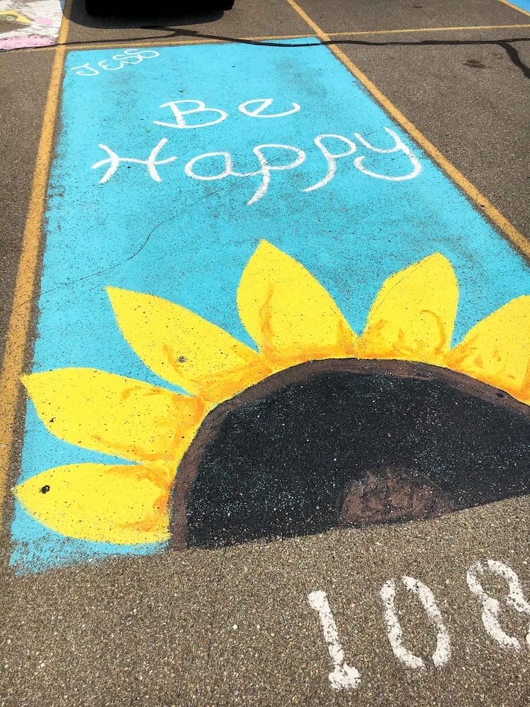 PHOTOS Lakota East seniors paint parking spots