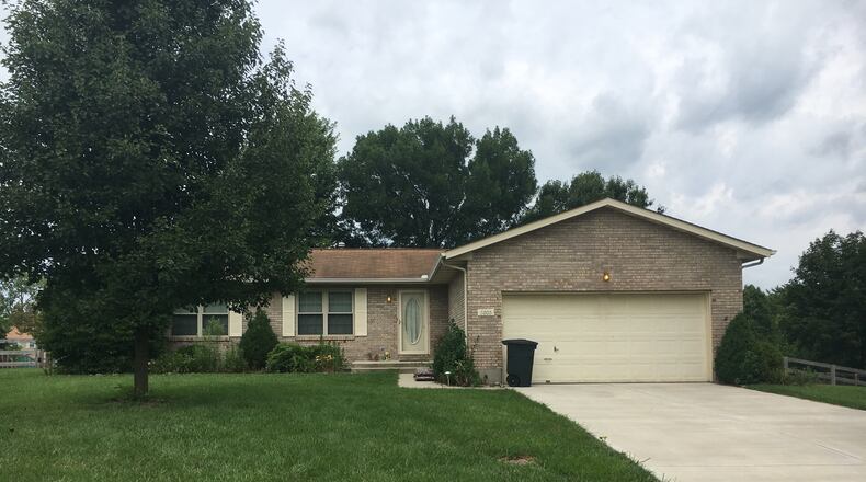 The home on Brooke Meadows Court in Fairfield Twp. where a murder-suicide happened last week. MICHAEL D. PITMAN/STAFF