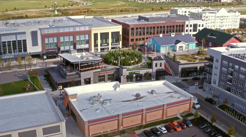 This rooftop garden at Liberty Center has a spiral walkway, Sabin Hall, TriHealth Triumph gardens and Unity Chapel and Kona Grill near The Square. TY GREENLEES / STAFF