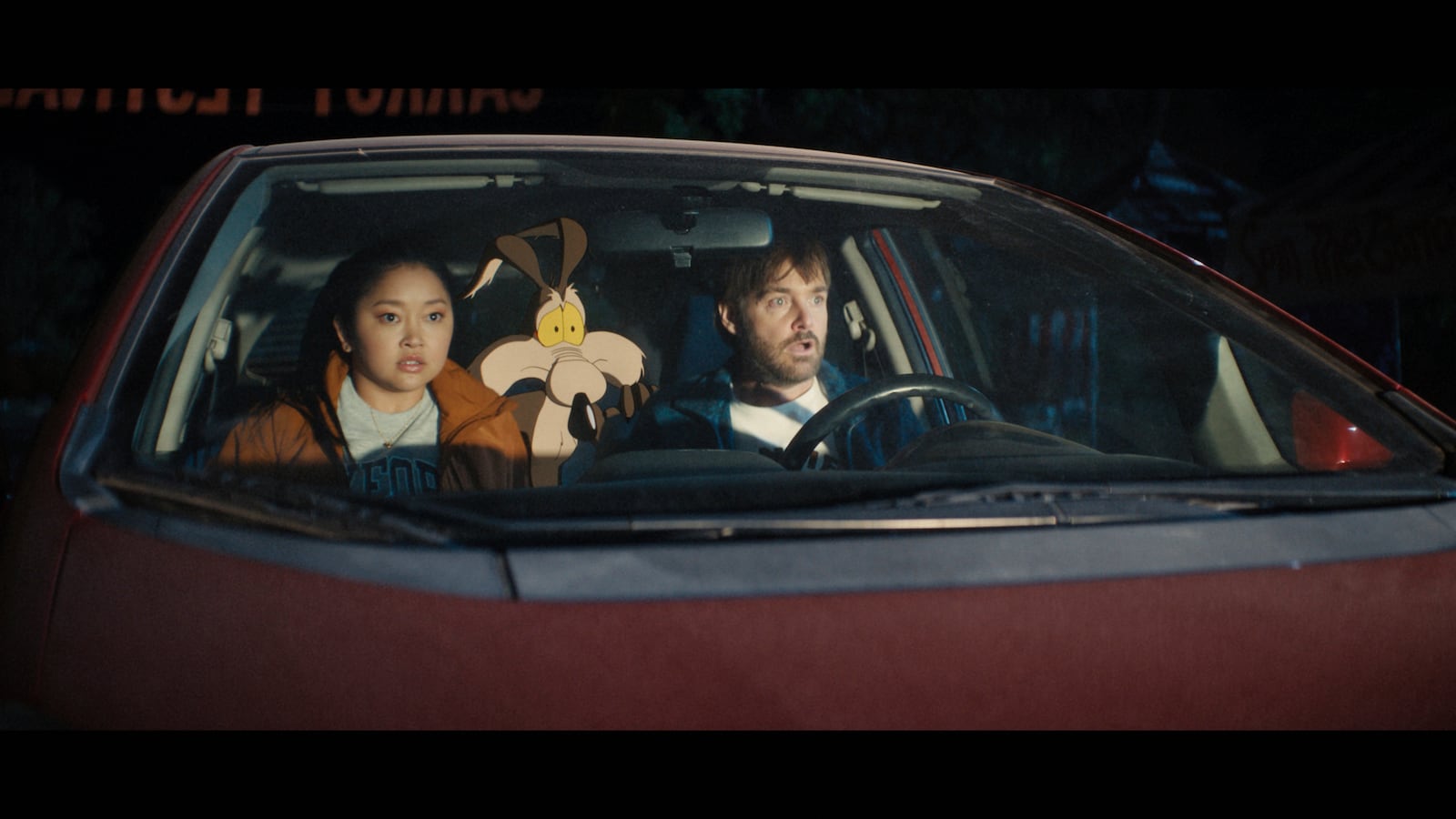 This image released by Ketchup Entertainment shows Lana Condor, left, and Will Forte in a scene from the film "Coyote vs. Acme." (Ketchup Entertainment via AP)