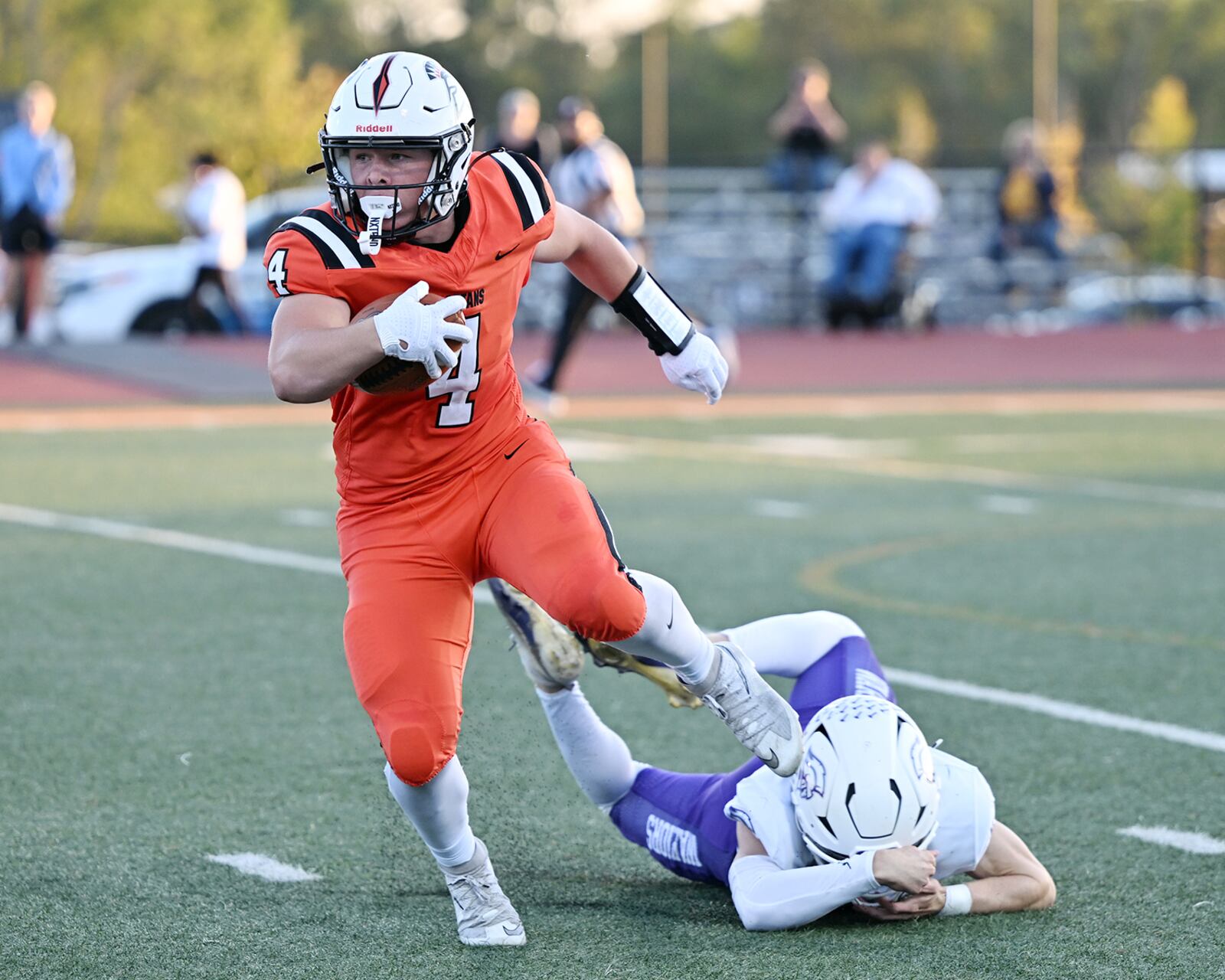 Waynesville High School sophomore Gregory Marlow slips past a Dayton Christian defending during their game on Friday, Sept. 26 at Spartan Stadium. The Spartans won 52-35. NICK FALZERANO / CONTRIBUTED PHOTO