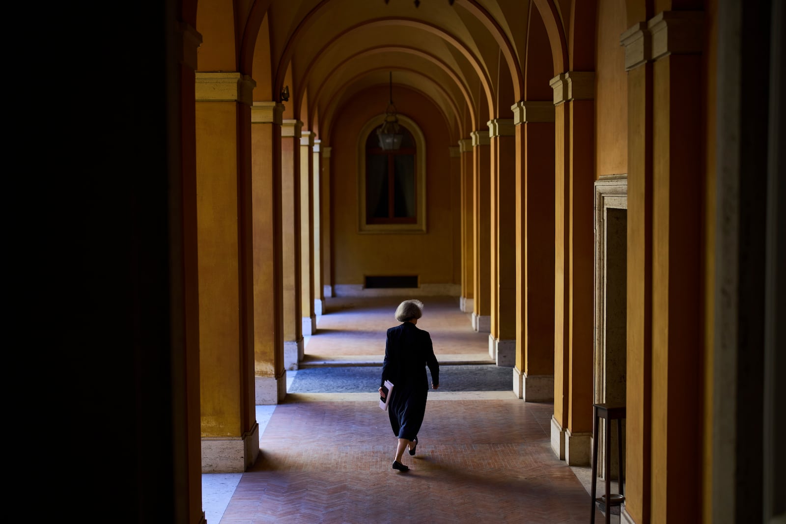 Sister Nathalie Becquart walks inside the General Secretariat of the Synod in Rome on Saturday, May 10, 2025. (AP Photo/Bernat Armangue)