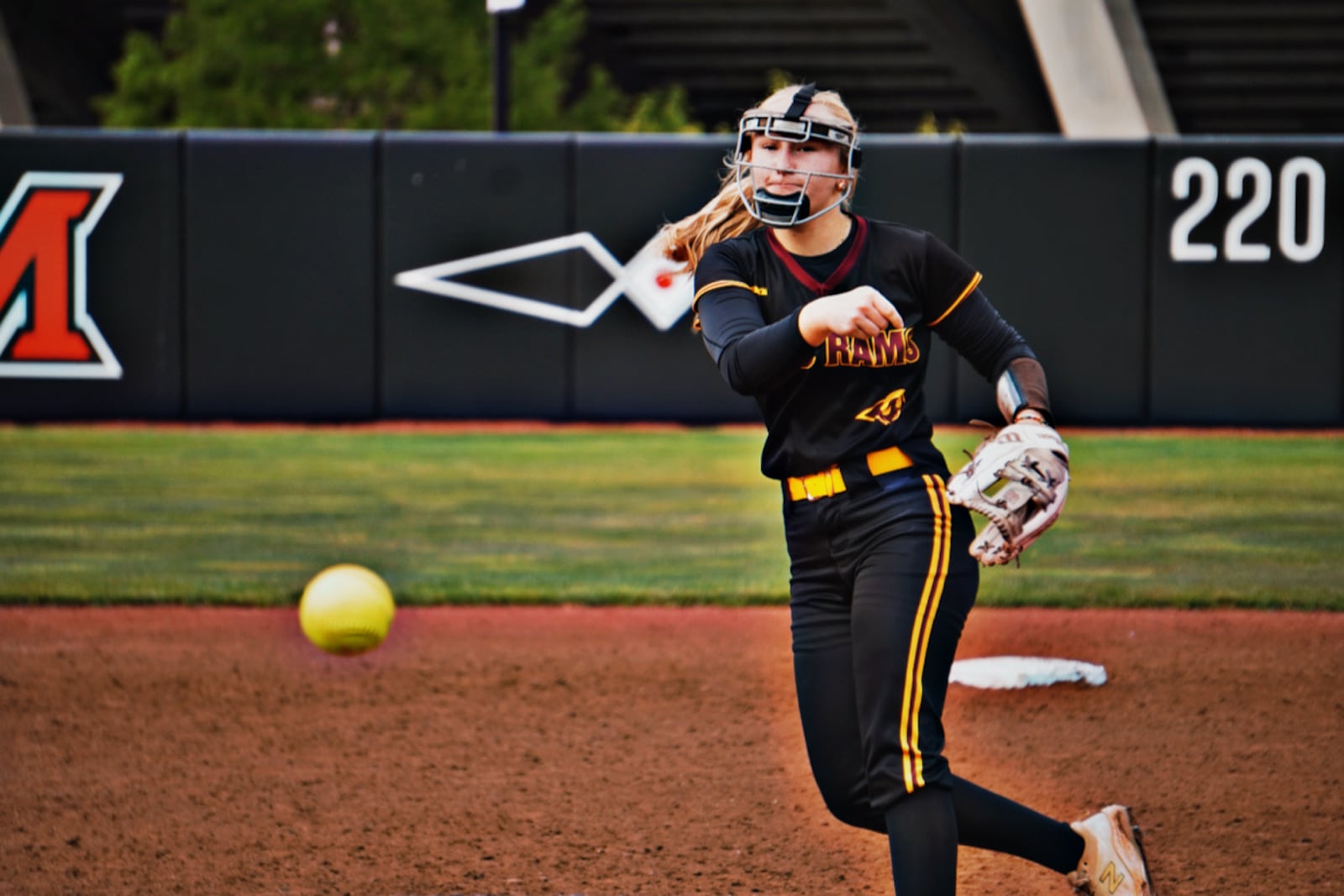 Ross sophomore Paige Baker sends a pitch to the plate during her Division III regional semifinal game against Western Brown on Wednesday at Miami University. CHRIS VOGT / CONTRIBUTED