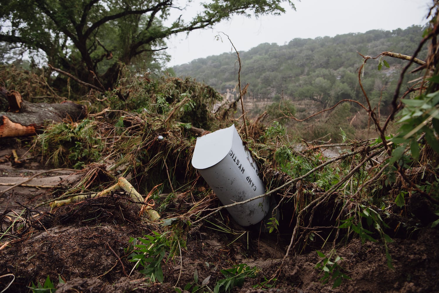 A mailbox for Camp Mystic among debris in Hunt, Texas, on Saturday, July 5, 2025. (Carter Johnston/The New York Times)