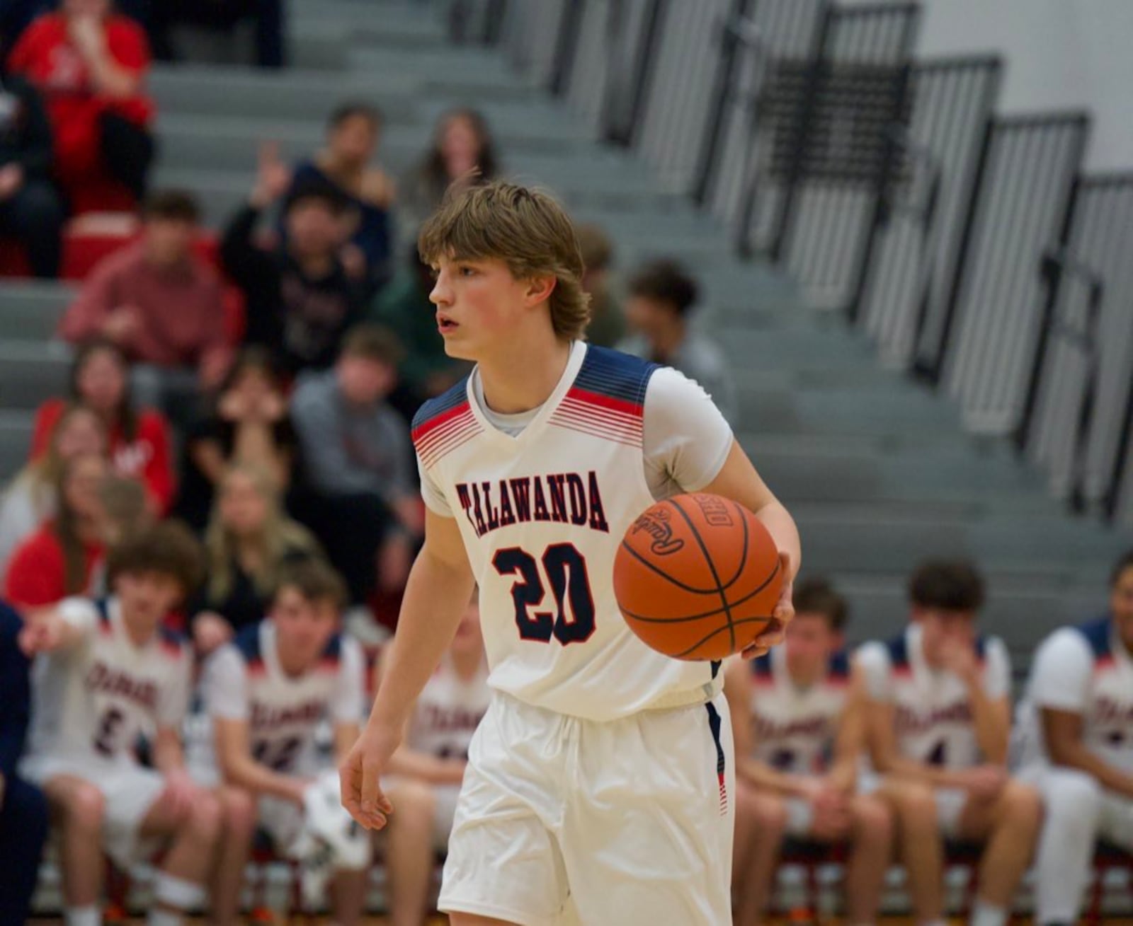 Talawanda's Jake Van Gorden dribbles the ball up court against Badin during a Division III tournament game on Friday night at Princeton. LAYTON HARTSOUGH / CONTRIBUTED
