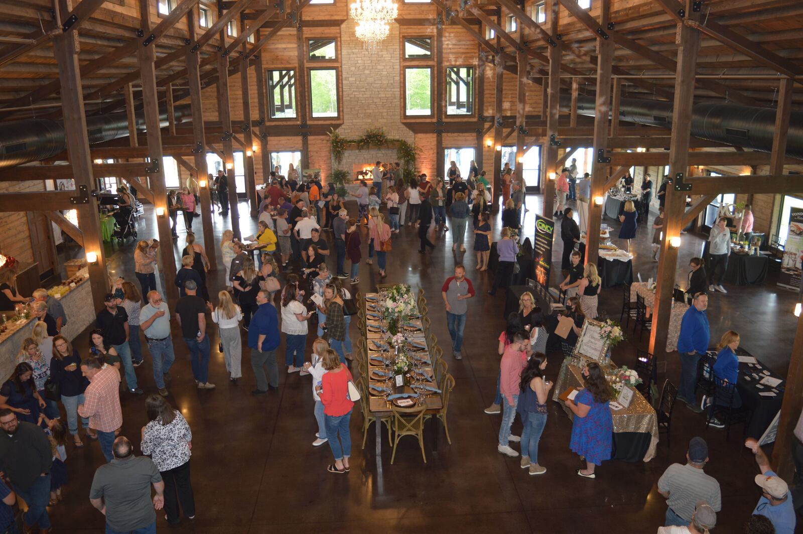 The size of the interior of the Hanover Reserve facility can be seen in this photo taken from the second-floor landing during the opening in May. A table was set as if for a reception or banquet with vendors set up on the right offering food samples and other services. CONTRIBUTED/BOB RATTERMAN