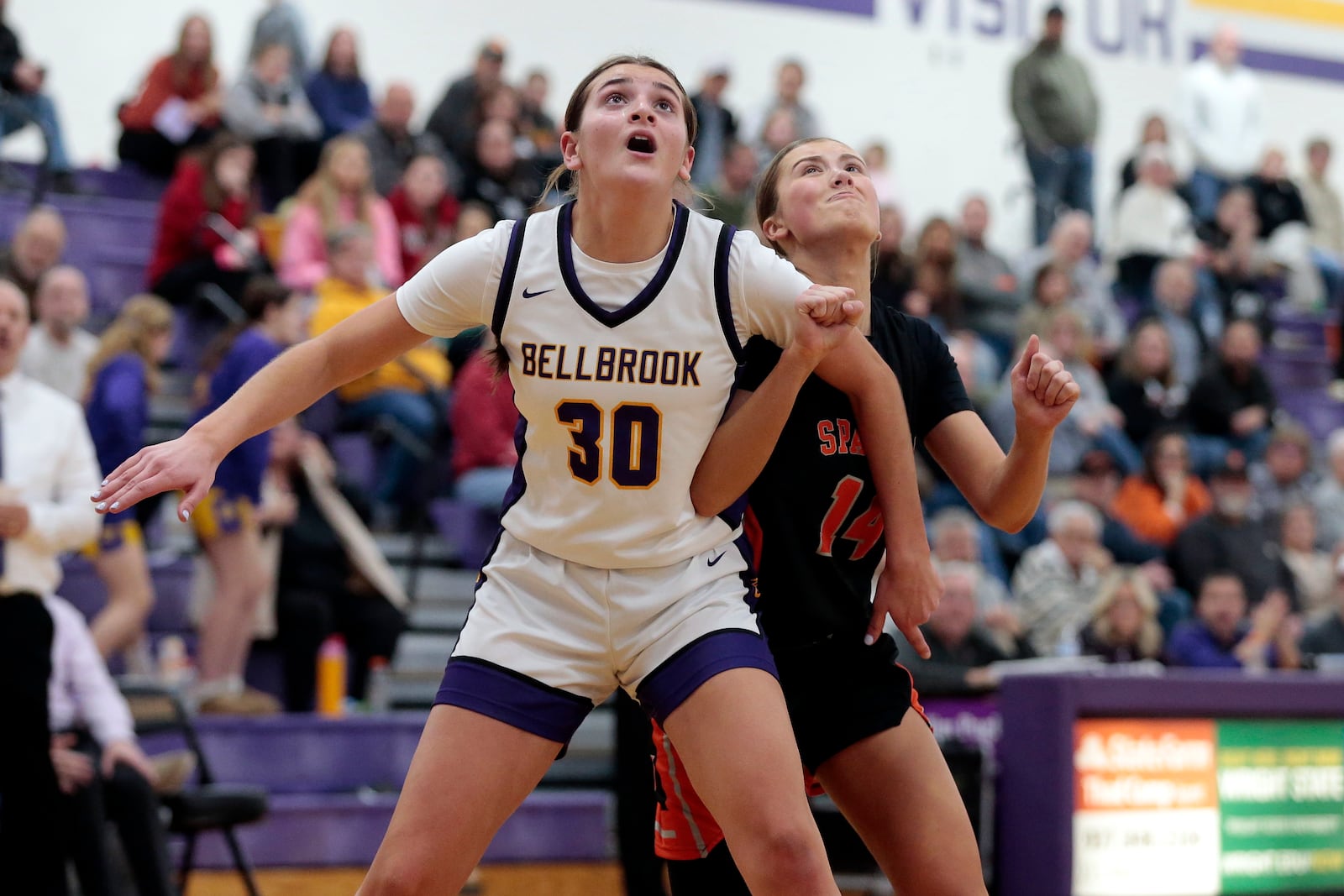Bellbrook senior Emmie Sears and Waynesville senior Bella Bradley battle for position on a rebound attempt. Bellbrook defeated Waynesville 61-30 in a Southwestern Buckeye League crossover game on Thursday, Feb. 12, 2026. STEVEN WRIGHT / STAFF