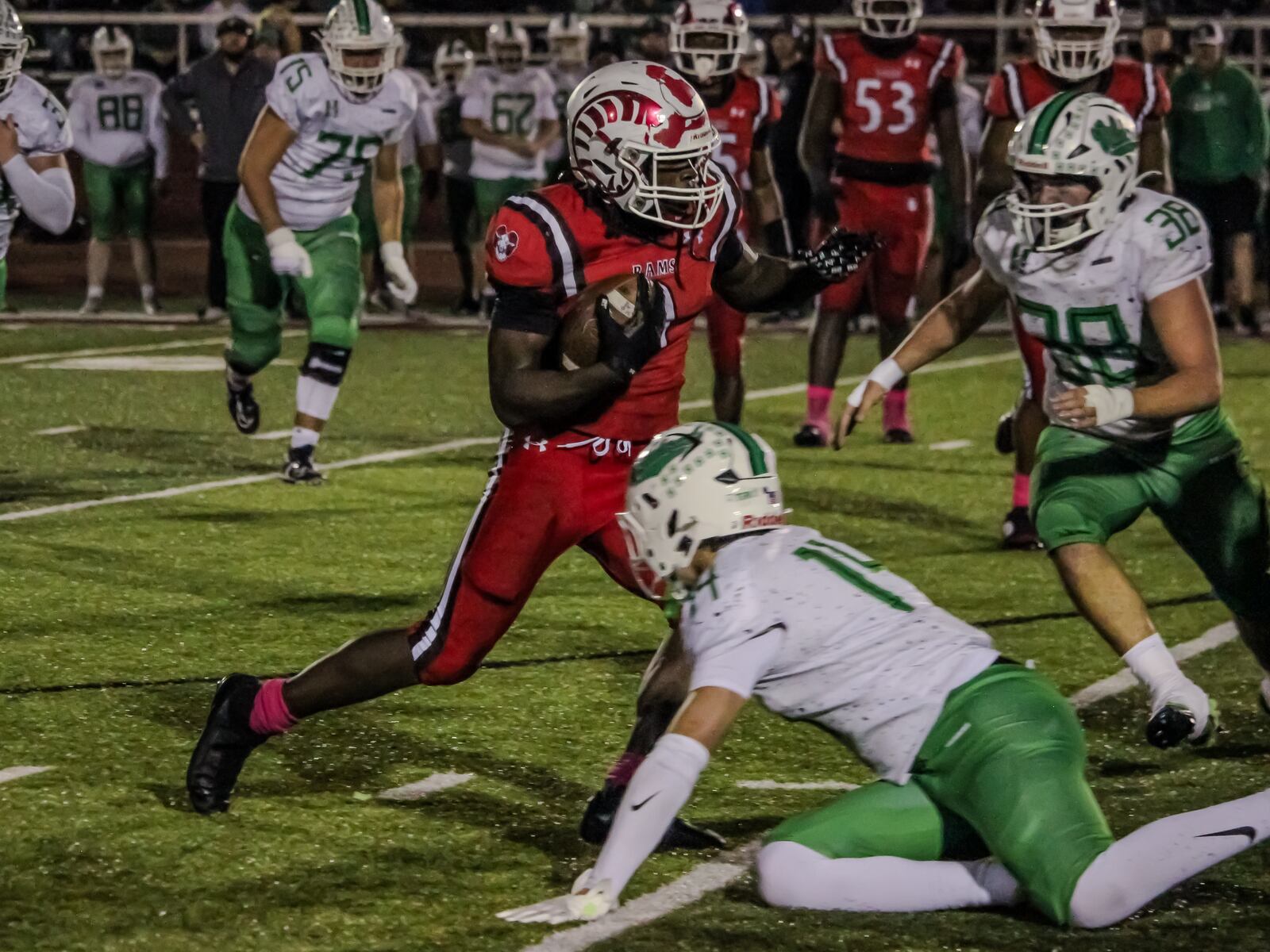 Trotwood-Madison High School's Terry Harrell runs the ball during their game against Harrison on Friday, Nov. 14 at Trotwood-Madison High School. HENRY S. CONTE / CONTRIBUTED PHOTO