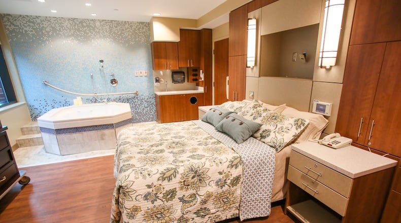 Natural Beginnings is the first natural birth center in the greater Cincinnati area to be located within an acute care hospital, according to officials at Atrium Medical Center. GREG LYNCH / STAFF