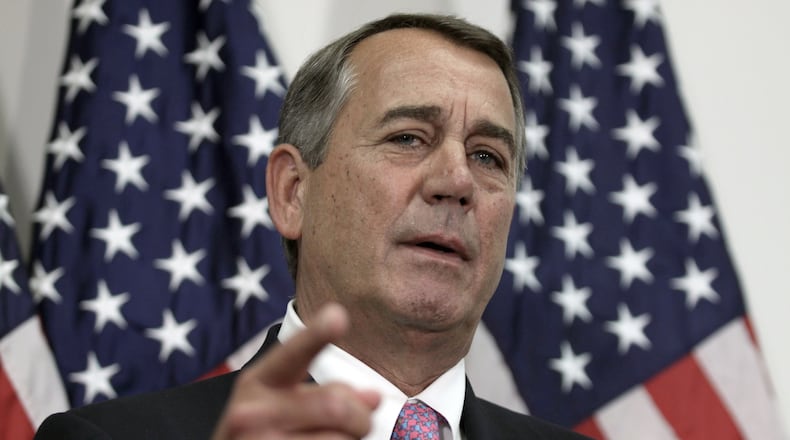 Outgoing House Speaker John Boehner of Ohio talks with reporters on Capitol Hill in Washington, Tuesday, Oct. 27, 2015. House Republican leaders on Tuesday pushed toward a vote on a two-year budget deal despite conservative opposition, relying on the backing of Democrats for the far-reaching pact struck with President Barack Obama. In his last days as speaker, John Boehner was intent on getting the measure through Congress and head off a market-rattling debt crisis next week and a debilitating government shutdown in December. The deal also would take budget showdowns off the table until after the 2016 presidential and congressional elections, a potential boon to the eventual GOP nominee and incumbents facing tough re-election fights. (AP Photo/Lauren Victoria Burke)