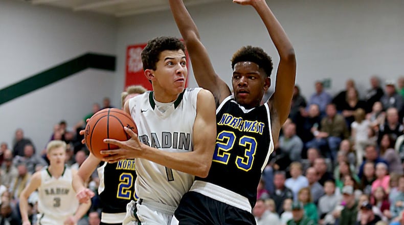 Badin wing Caleb Meyer is covered by Northwest guard Tyree McKinney during their game at Mulcahey Gym in Hamilton on Wednesday night. CONTRIBUTED PHOTO BY E.L. HUBBARD
