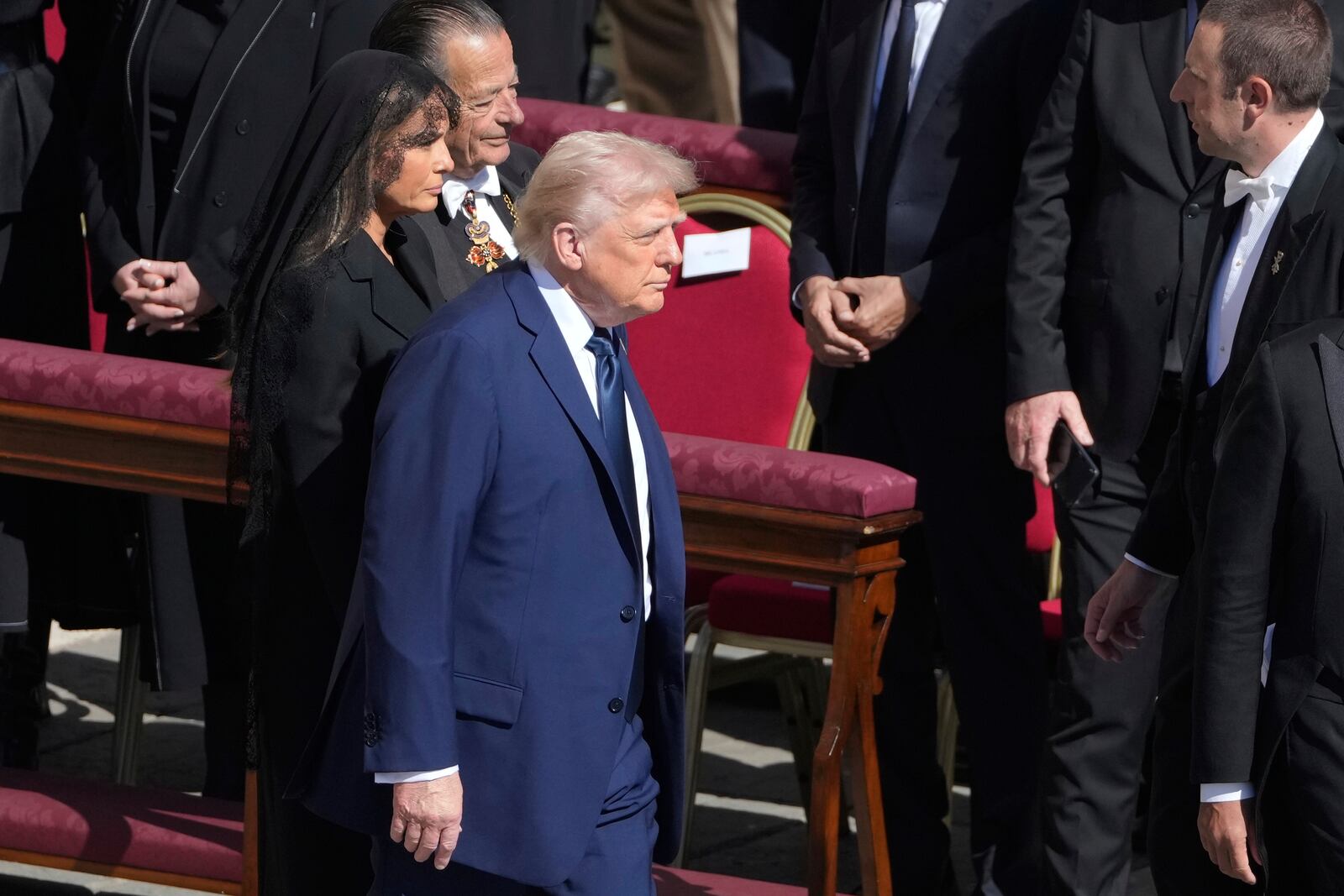 President Donald Trump and first lady Melania Trump arrive for the funeral of Pope Francis in St. Peter's Square at the Vatican, Saturday, April 26, 2025. (AP Photo/Markus Schreiber)