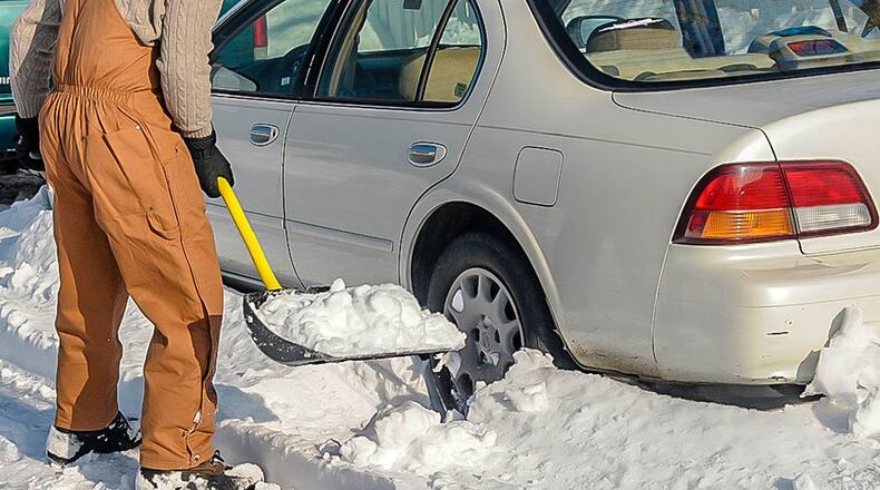 It pays to completely clean snow and ice off your car, truck or van. Metro News Service photo