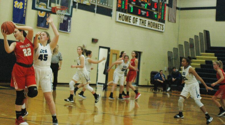 Cincinnati Christian’s Briahna Bush (45) pressures South Charleston Southeastern’s Uxue Ruiz De Olano (22) during Wednesday night’s Division IV sectional game at Monroe. Southeastern won 40-12. RICK CASSANO/STAFF