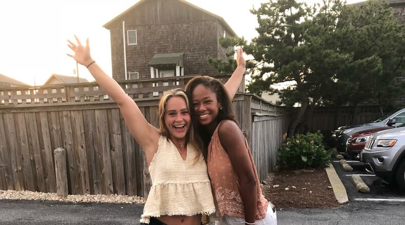 Kasey Hughes (left), who played basketball at Baldwin Wallace, and Cameron Campbell (right), a track athlete at Wright State, became friends as 8-year-old soccer teammates and continued their bond through Springboro High School and now as recent college graduates. The pair miraculously survived the Oregon District mass shooting last Aug. 4 . CONTRIBUTED