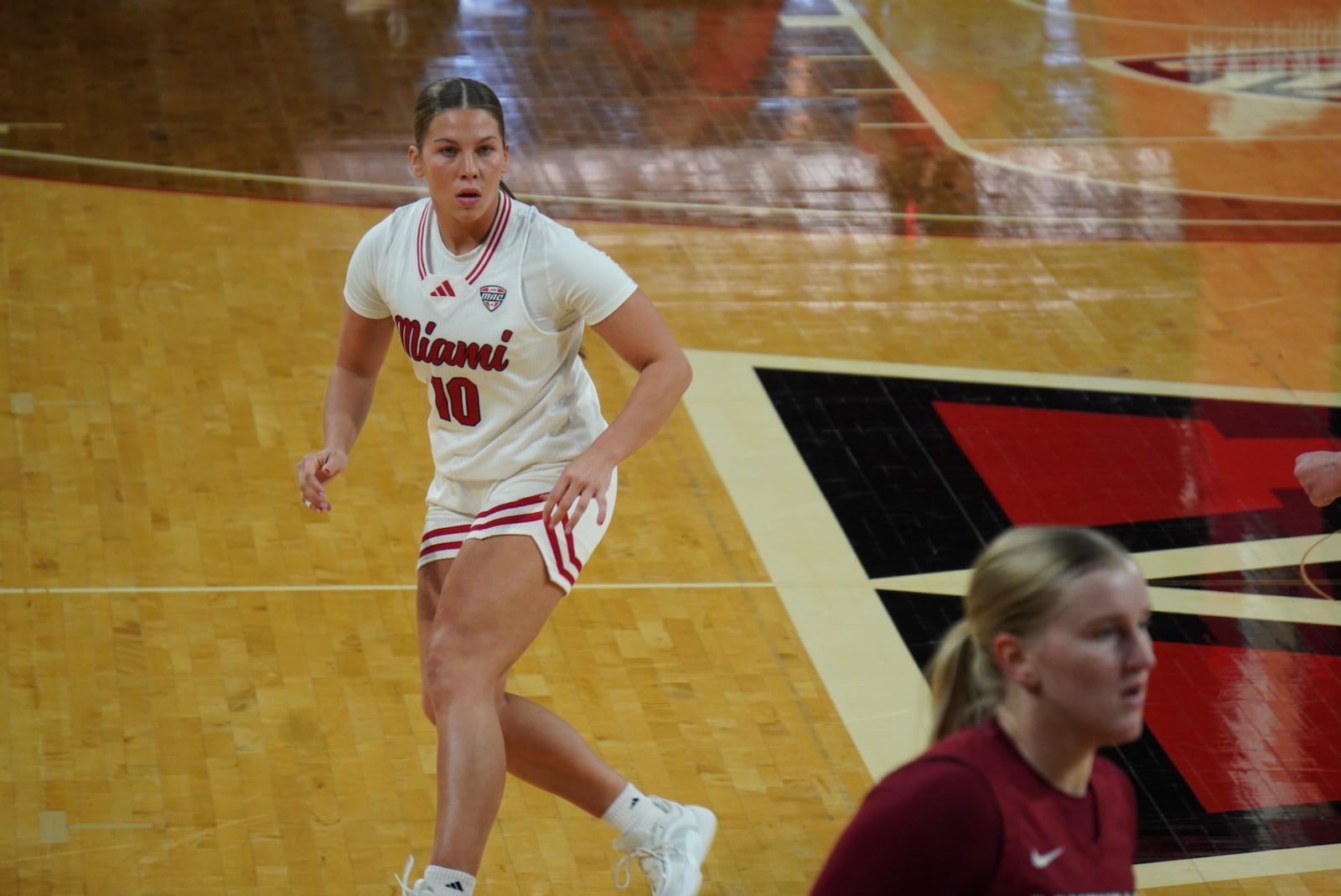 Miami's Macie Taylor plays defense against Indiana-Southeast on Thursday afternoon at Millett Hall. CHRIS VOGT / CONTRIBUTED