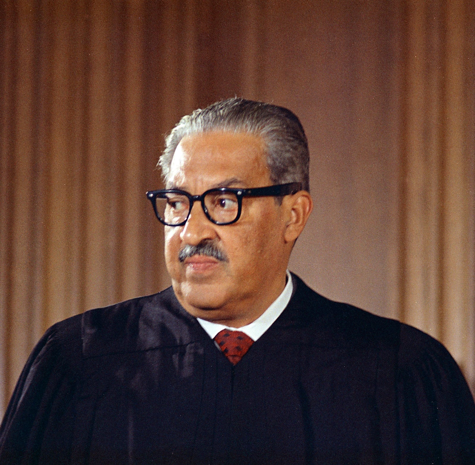 FILE - Supreme Court Associate Justice Thurgood Marshall poses for a photo in Washington, Oct. 24, 1967. Marshall joined the Supreme Court in 1967 as the court's first Black justice. (AP Photo/Charles Tasnadi, File)
